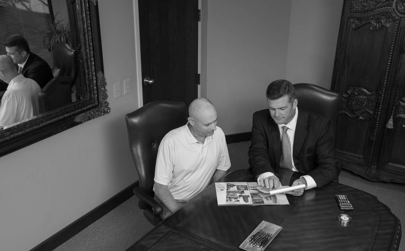 Rick Gardner helping a client with investment management and financial planning